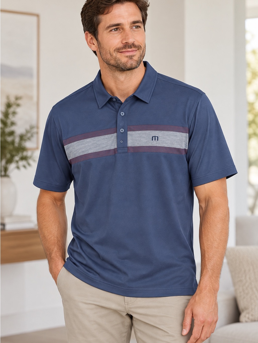 Travis Mathew Navy Polo with Horizontal Chest Stripe